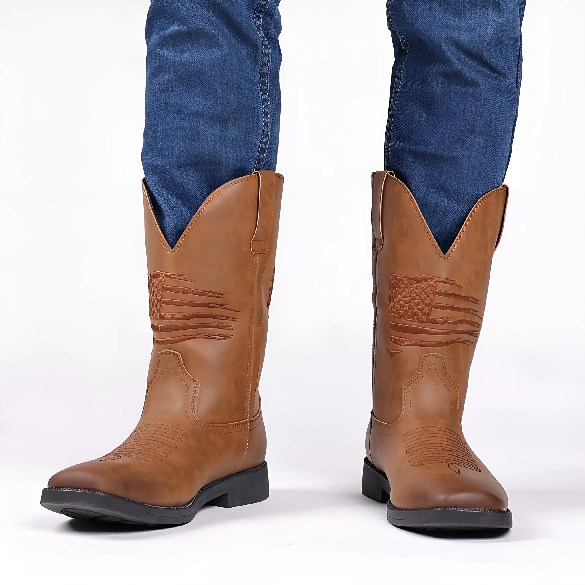 Brown retro cowboy boots with embroidered design, square toe, and high shaft