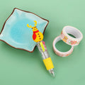 Compact 11cm Christmas four-colour ballpoint pen with press mechanism in festive designs