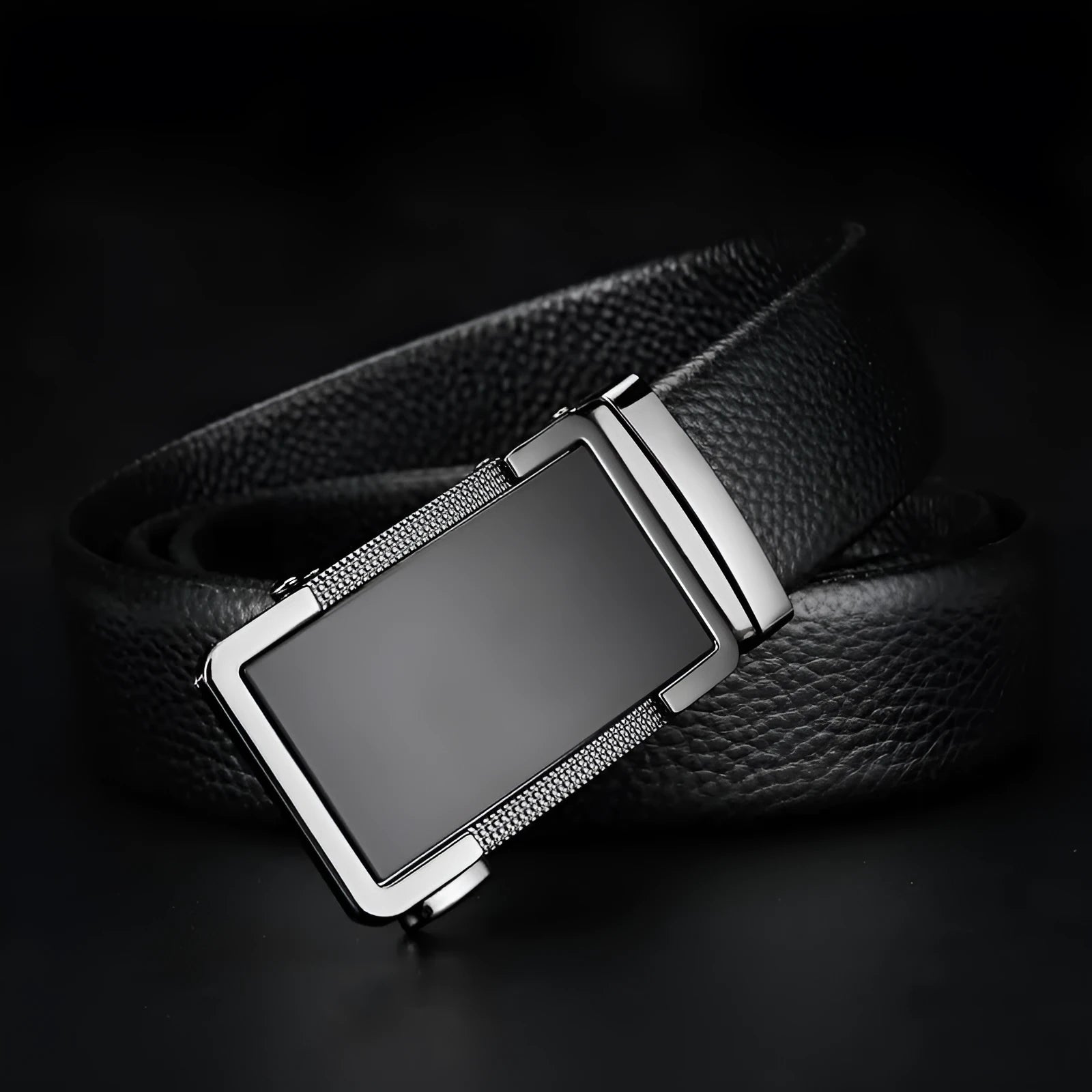 Men's leather automatic click belt in gold, silver, and gun black finishes showing buckle detail