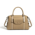Genuine leather ladies handbag with contrast stitching and metal lock detail