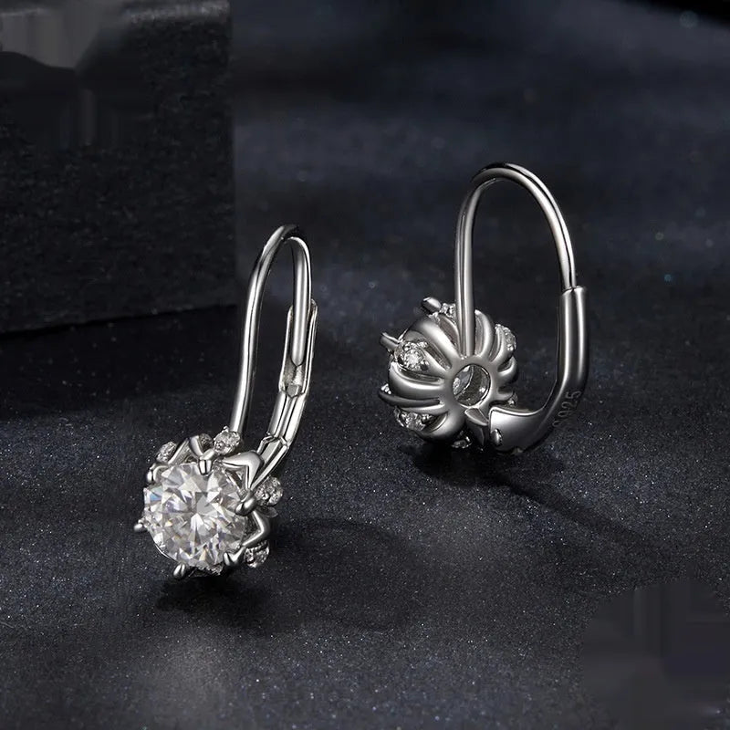 Sterling silver flower bud ear clips with white gold plating and 0.5ct moissanite stone