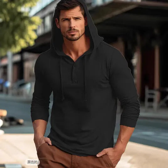 A cotton pullover hoodie for youth in dark blue, shown in a casual setting.