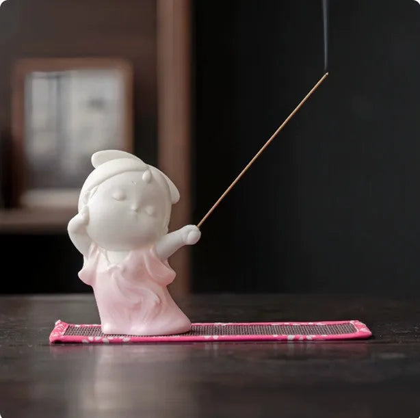 Small ceramic female court attendant figurine incense burner decoration in a cute style.