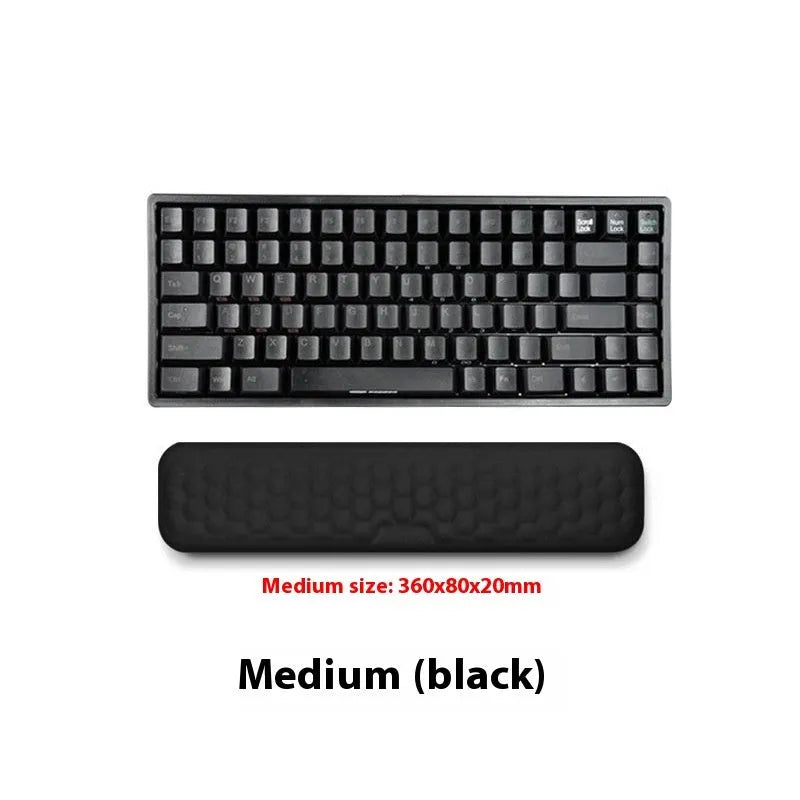 Black cowhide keyboard wrist rest with non-slip base and waterproof coating on desk