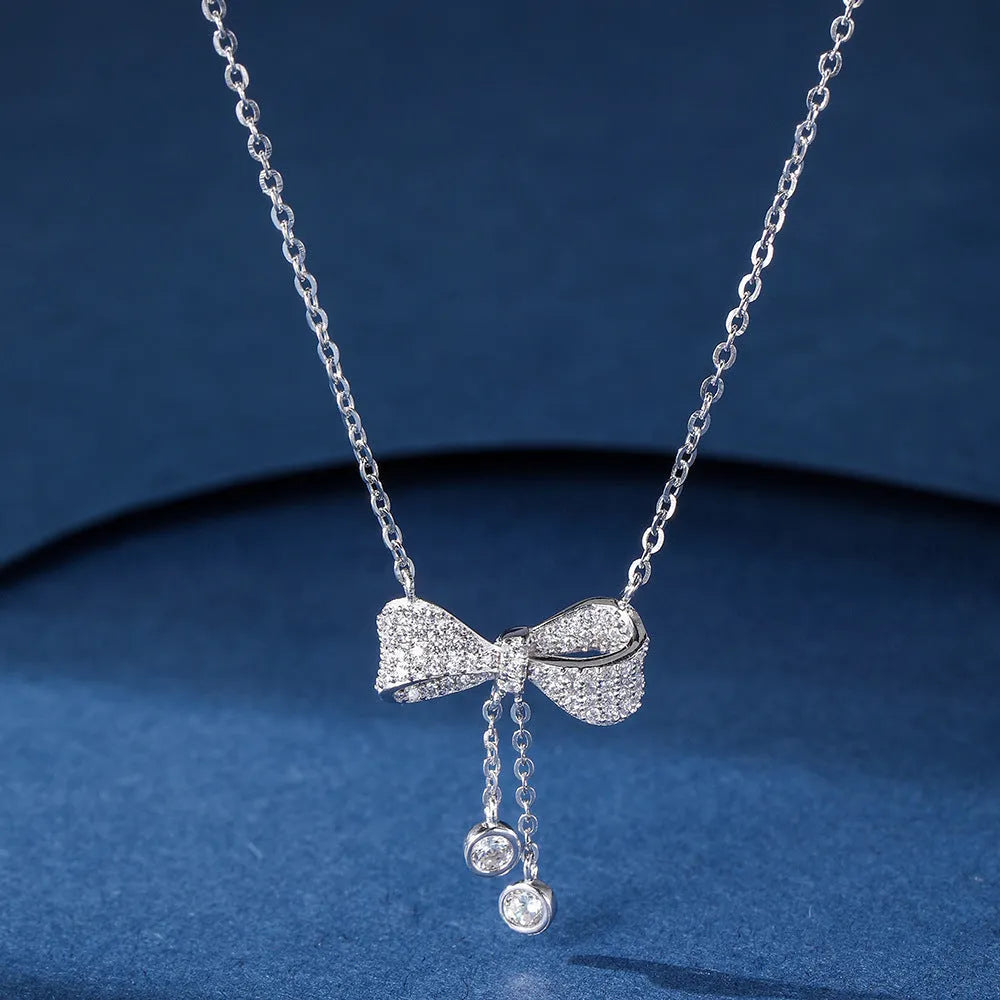 S925 sterling silver bow pendant necklace on woman with adjustable 40-45cm clavicle chain