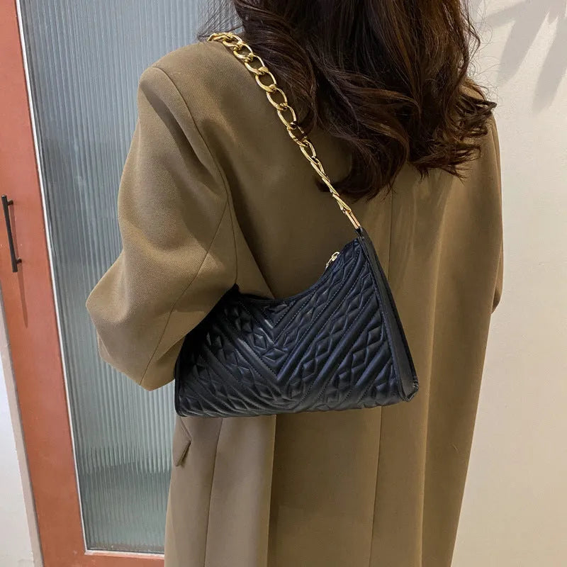 Soft PU leather pleated chain baguette shoulder bag in a vertical square shape, shown in brown colour.