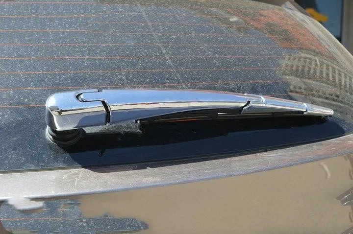 Four silvery ABS plastic rear window wiper cover trims for 2010 Hyundai models.