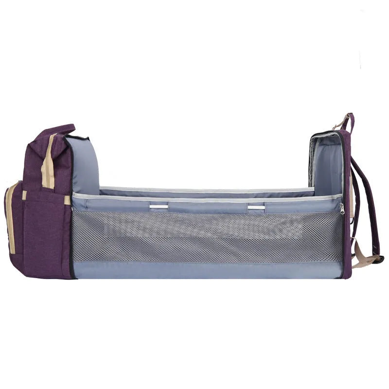 Portable folding mummy bag in multiple colours with curved shoulder strap and USB interface