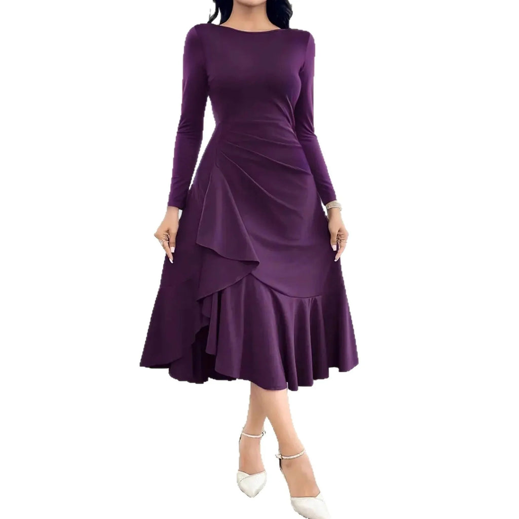 Purple women's long sleeve dress with ruffles, a round neck, and a mid waist fit on a hanger.