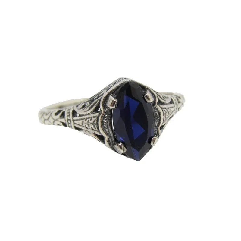 Silver women's geometric hollow ring with zircon detailing on finger