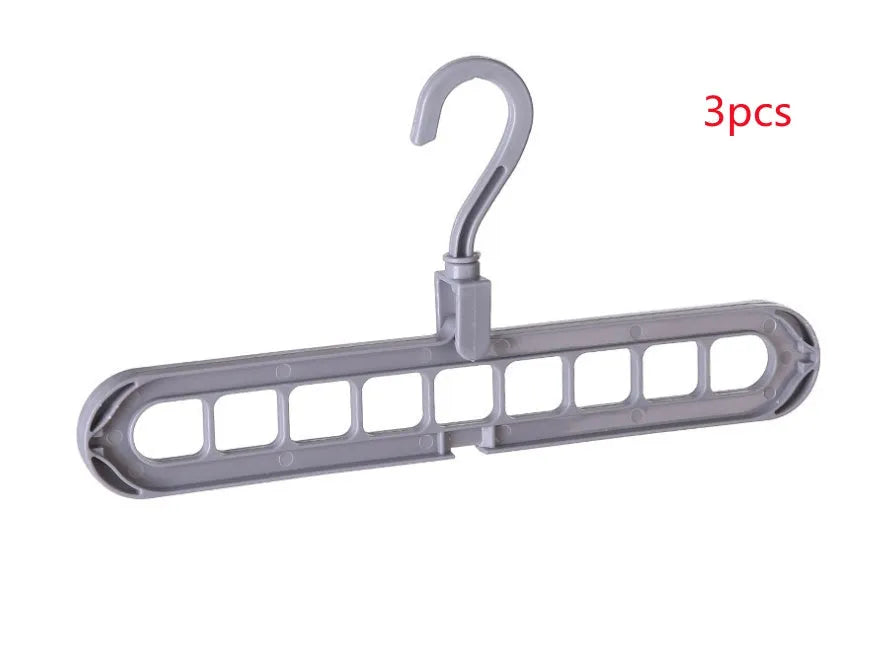 Plastic clothes hanger with rotating hook in pink colour, showing 33cm length dimension