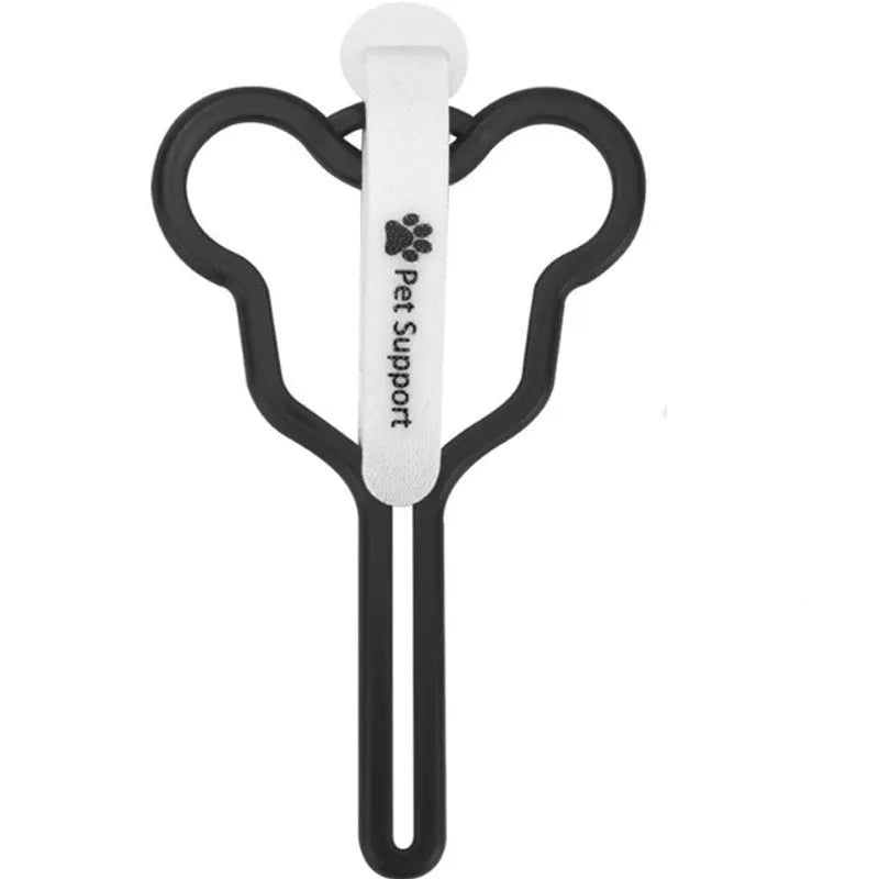 Hands-free dog poop bag holder with black velcro strap and clip attached to a dog leash.