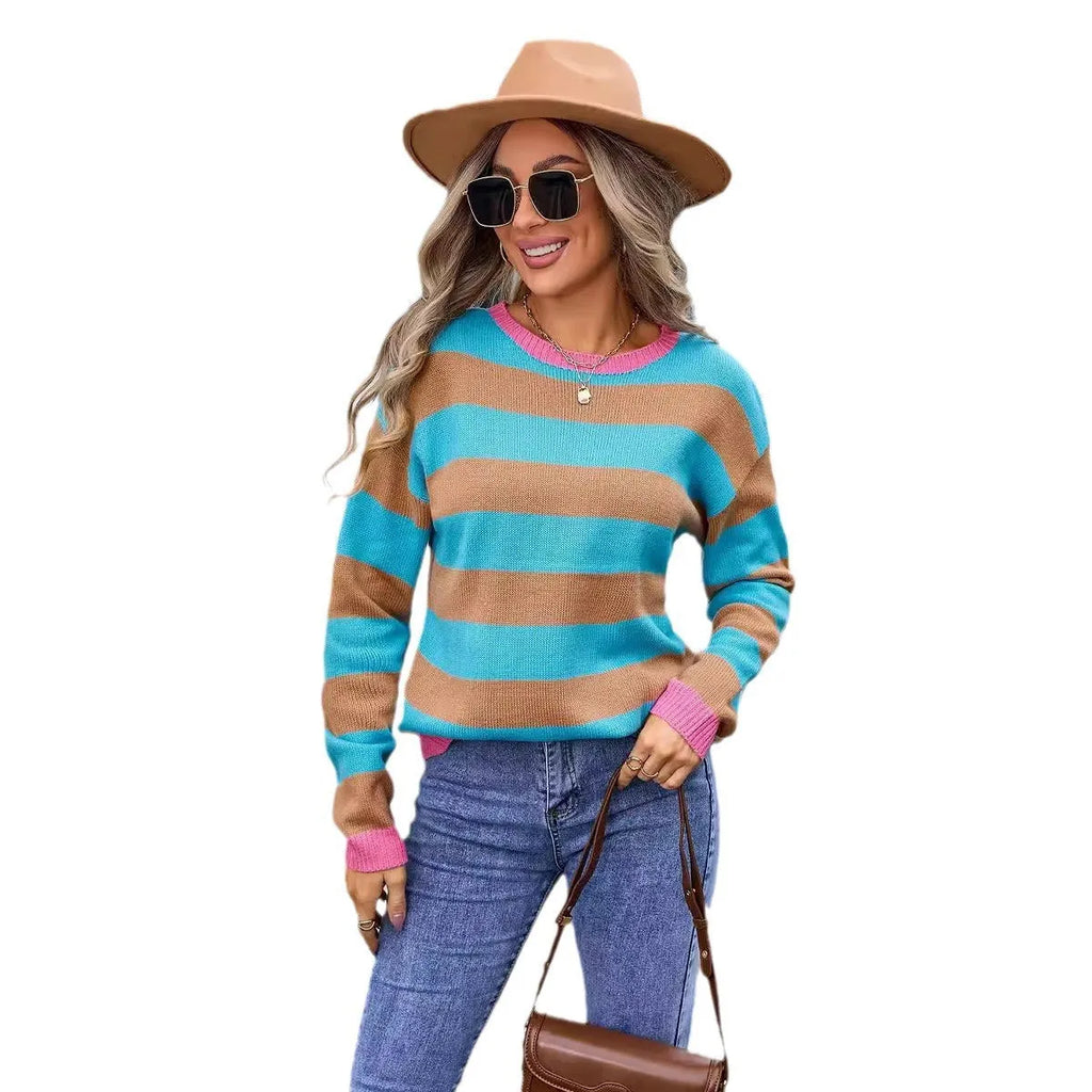 Women's loose long sleeve acrylic sweater in blue with stripes, round neck.