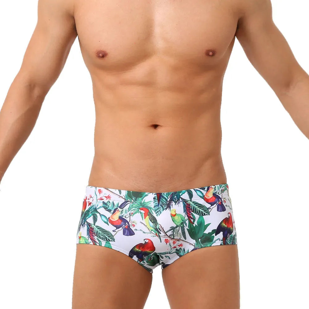 Men's floral print nylon swimming trunks with a cup cover, shown in the 619 flowers and birds colour pattern.