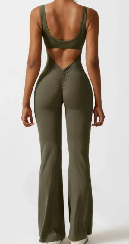 Women's tight seamless yoga bodysuit with hollow-out design and chest padding in black colour