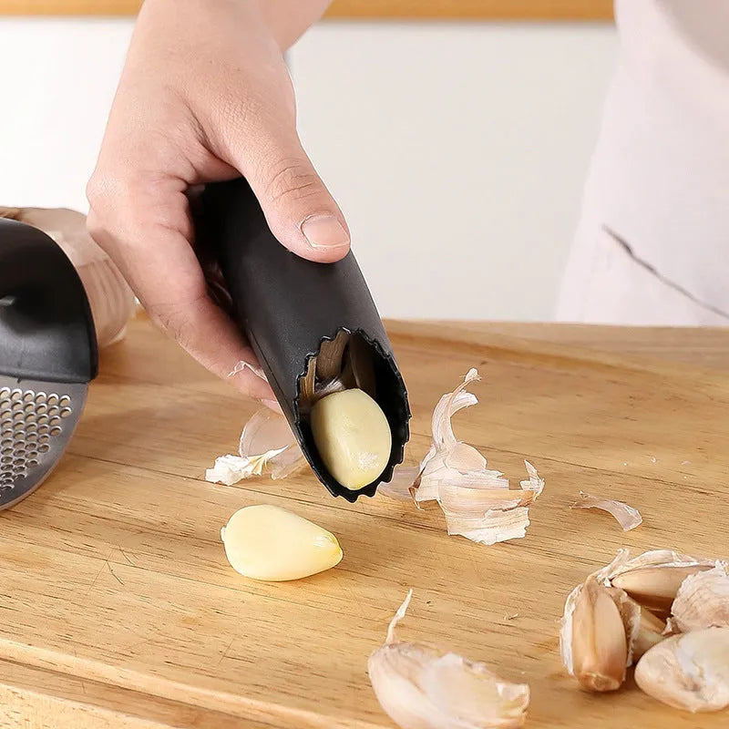 304 stainless steel garlic press in black, blue, green, and pink colour options