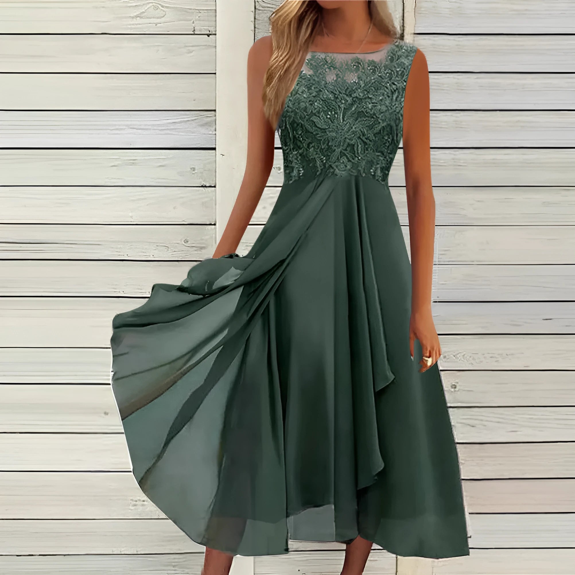 Women's sleeveless chiffon dress with lace hollow-out stitching in green, shown in midi length princess style