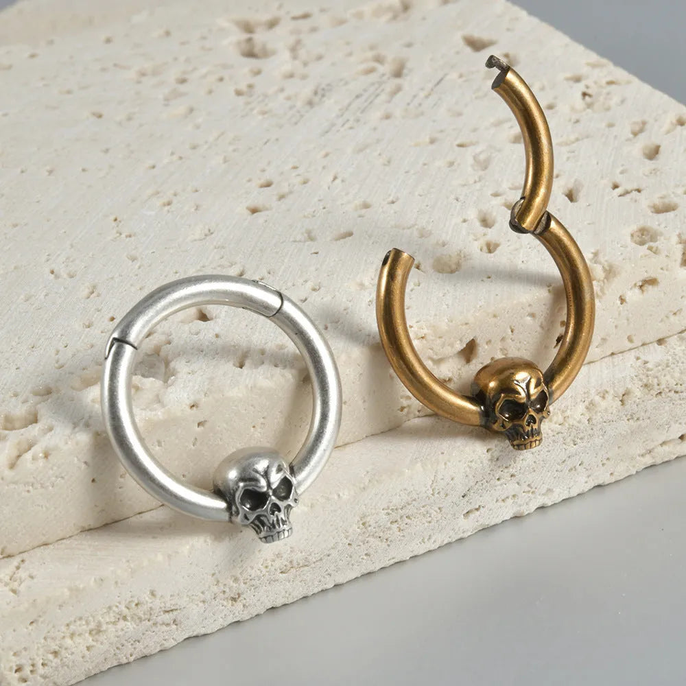 Copper punk earrings with vintage ghost head design in antique gold and silver finishes