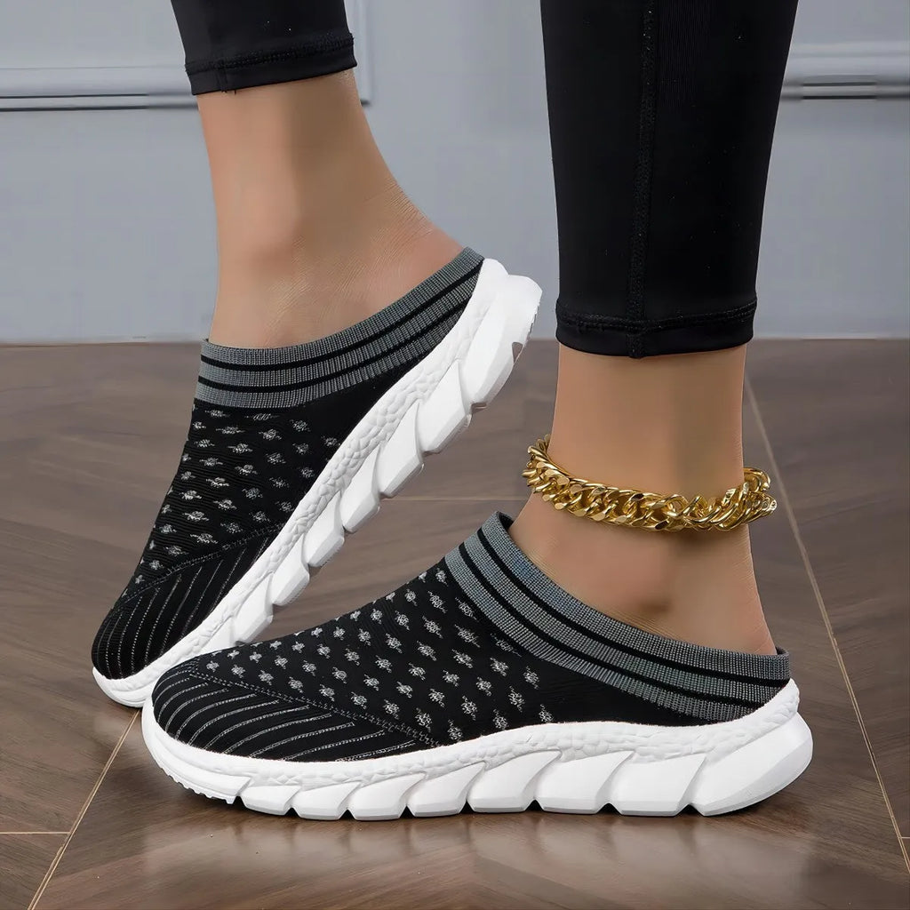 Women's black striped Flyknit socks semi slipper shoes with hollowed-out design and viscose sole.