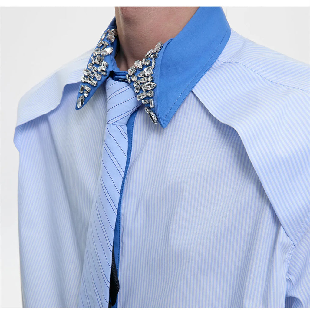 Men's blue and khaki patchwork striped shirt with diamond tie detail and quilted texture.