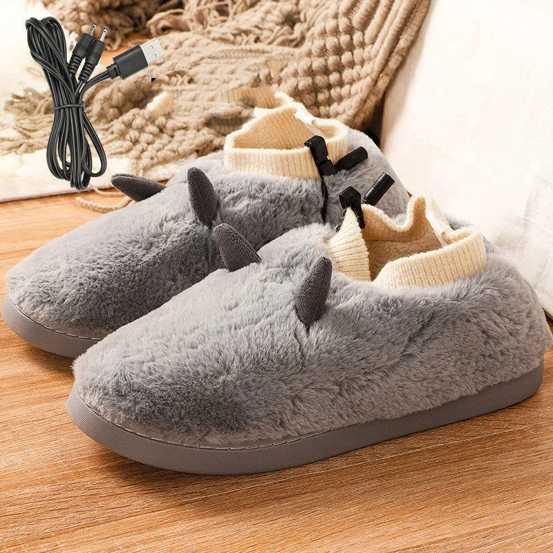 USB electric heating slippers in velvet, showing USB cable connection and adjustable temperature control.