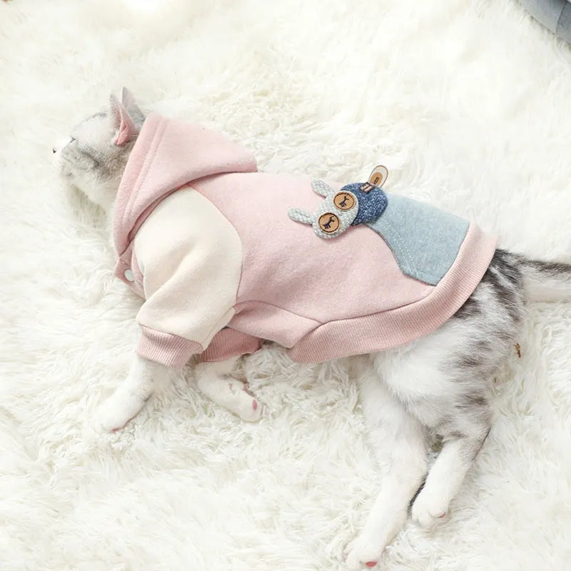 A brown cotton blend dog sweatshirt shown on a mannequin, size label visible.