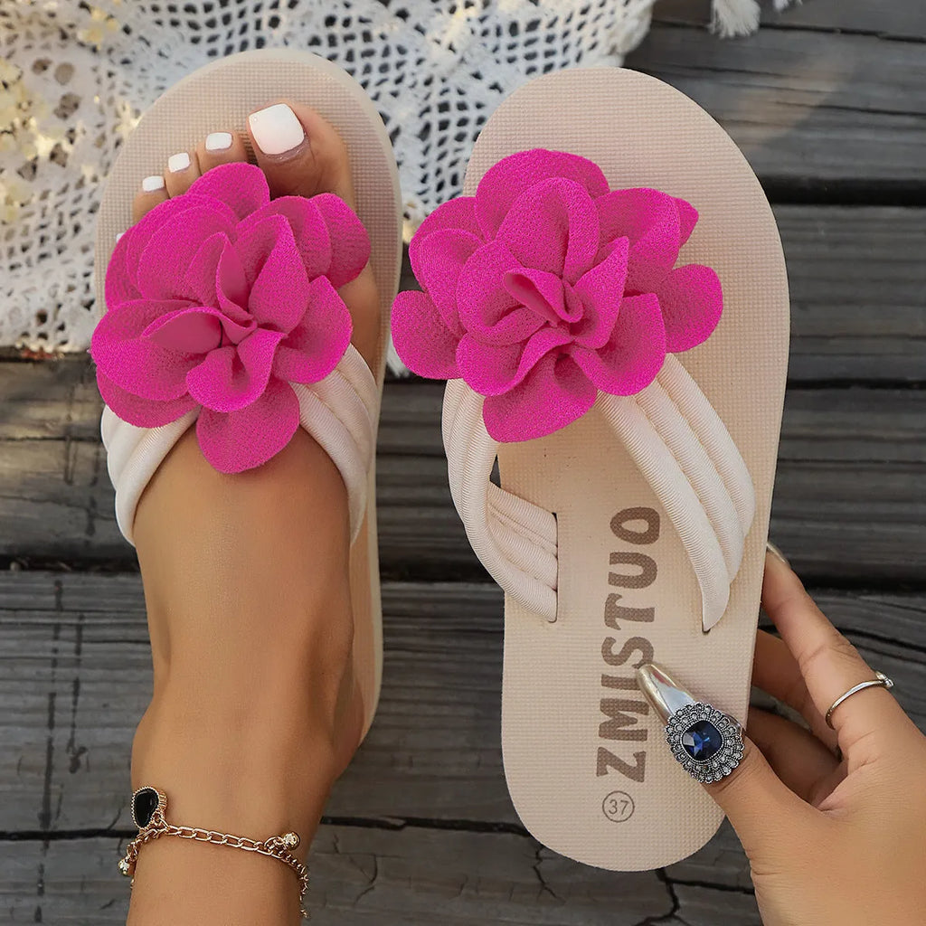 Women's floral pattern PU slippers in beige, shown in a casual flip-flop style with a round toe.