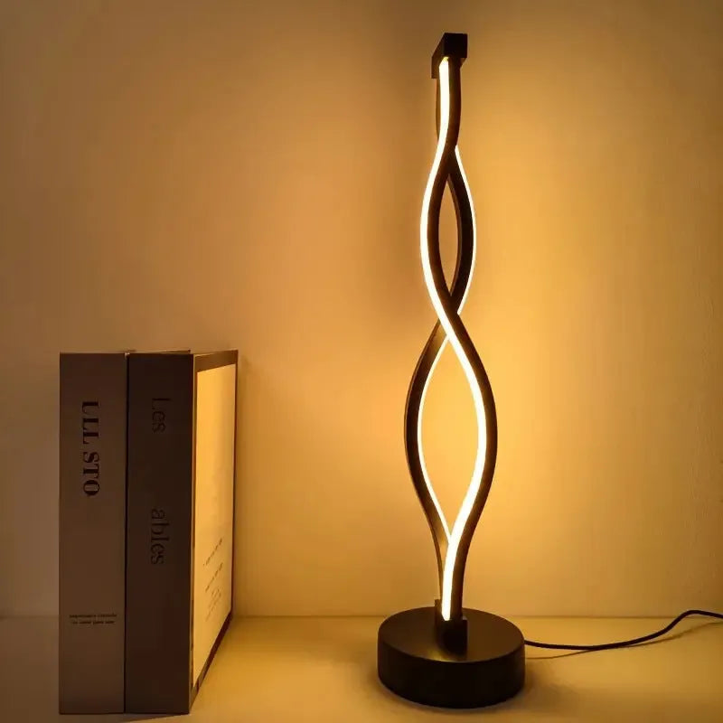 Black aluminium desk lamp with touch dimming controls and three-colour button