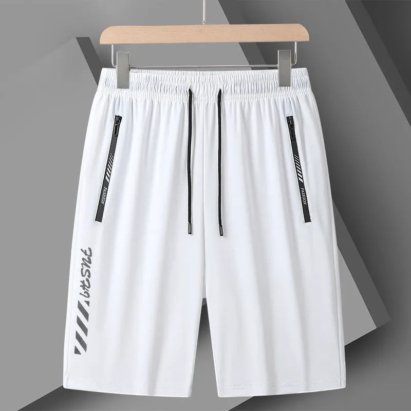 Men's black quick-dry nylon sports shorts with loose fit and fifth pants length on hanger