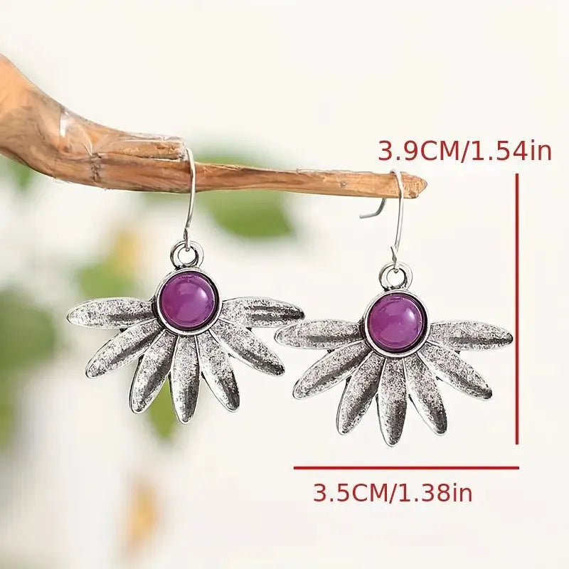 Purple resin bohemian flower statement earrings with animal zodiac design on alloy frame.
