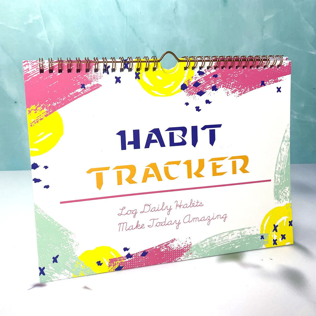 English habit tracking notebook with 12 pages in A4 21cm by 28cm format showing colour options
