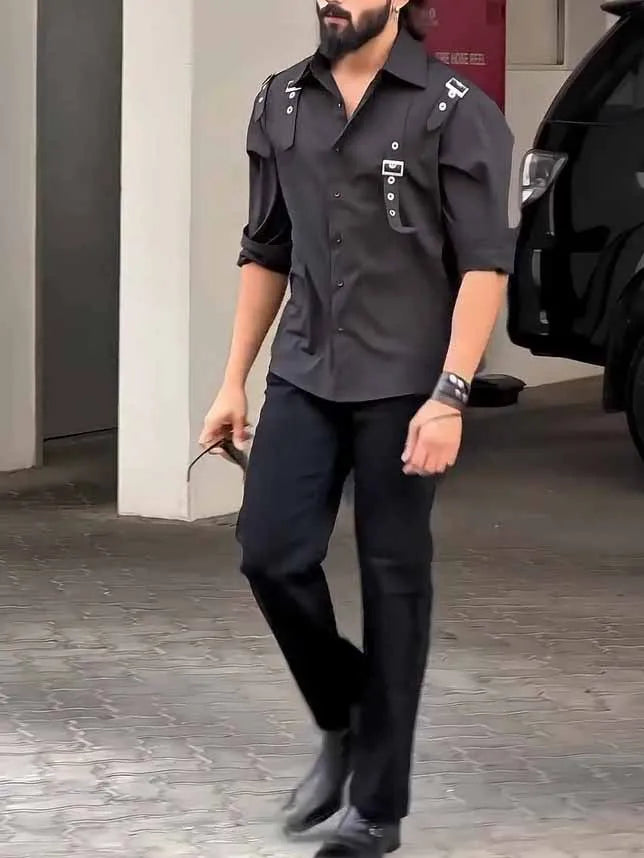 Black men's utility style button-up shirt with regular fit on a mannequin.