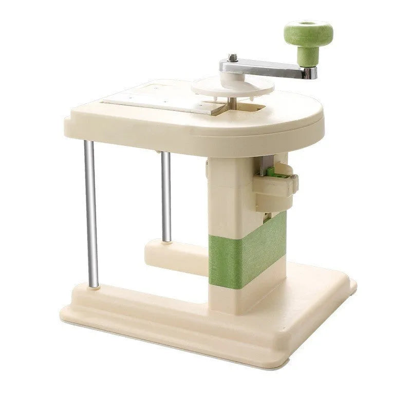 Beige kitchen vegetable slicer grater with stainless steel blades for spiralising and shredding