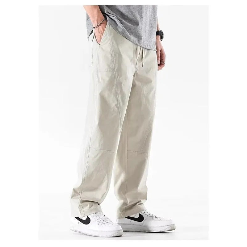 Women's milky white cotton wide-leg casual trousers with an antibacterial feature on a hanger.