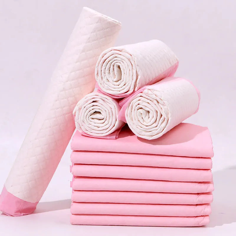 Pack of pet urinal pads showing different sizes and absorbency types for dogs and cats