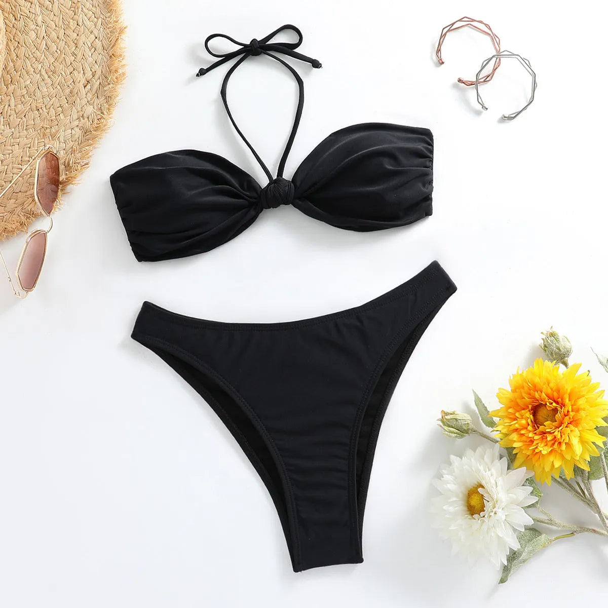 Black women's bikini set with lace-up front tube top and matching briefs