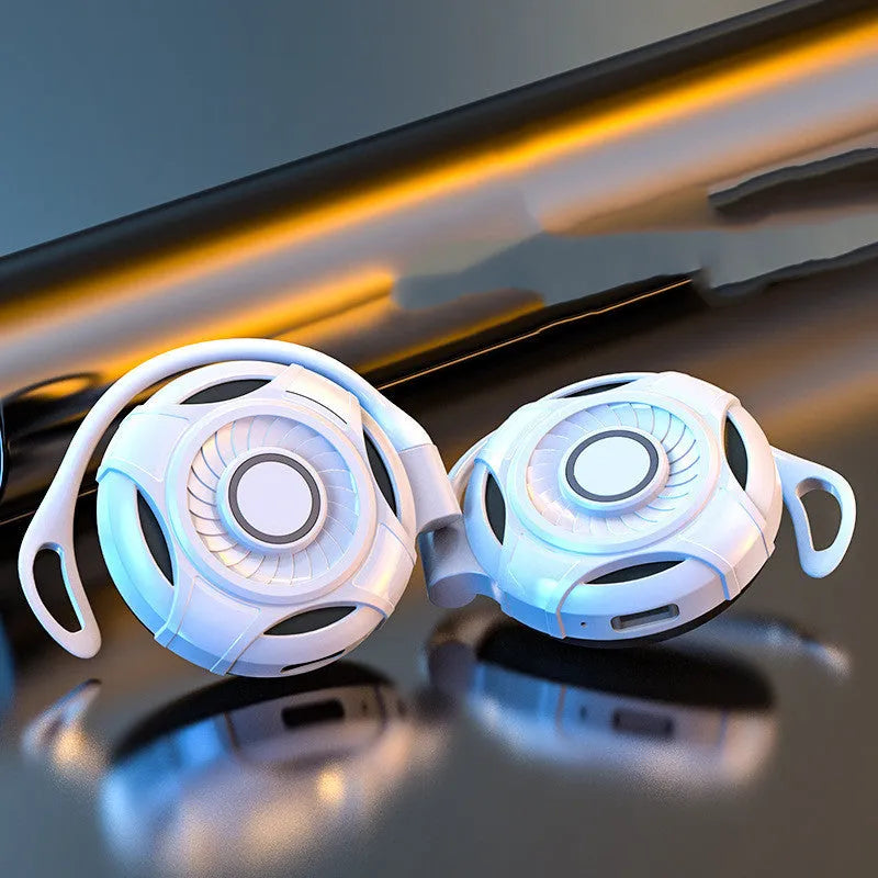 Black and white wireless Bluetooth earphones with hanging ear design and USB connectivity