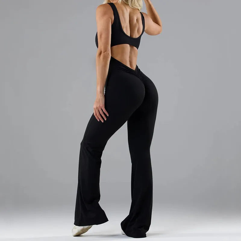 Women's tight seamless yoga bodysuit with hollow-out design and chest padding in black colour