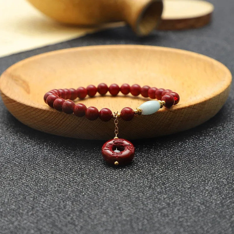 Handmade cinnabar fox pendant bracelet with peace buckle and auspicious cloud motifs