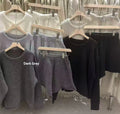 Women's loose-fitting knitted sweater and wide leg shorts two-piece set in oatmeal colour