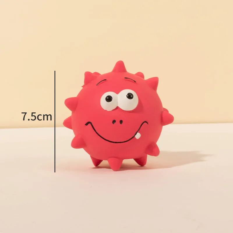 Four colourful natural latex squeaky dog balls with bumpy texture and cute faces