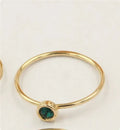 14K gold plated zircon knuckle ring on finger showing copper base with decorative stones