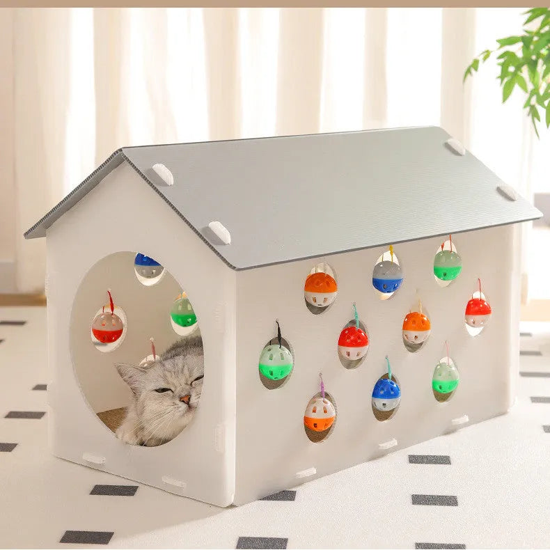 House-shaped cat scratch board with integrated bell ball and plastic tunnel forming multifunctional cat furniture