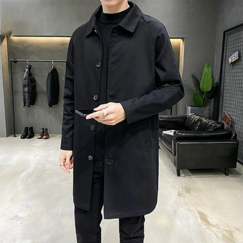 Men's mid-length loose trench coat in thin rabbit fur fabric showing casual styling