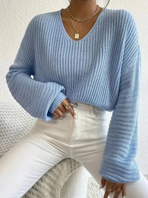 Women's solid colour long sleeve loose pullover in black, pink, green, blue, or red.