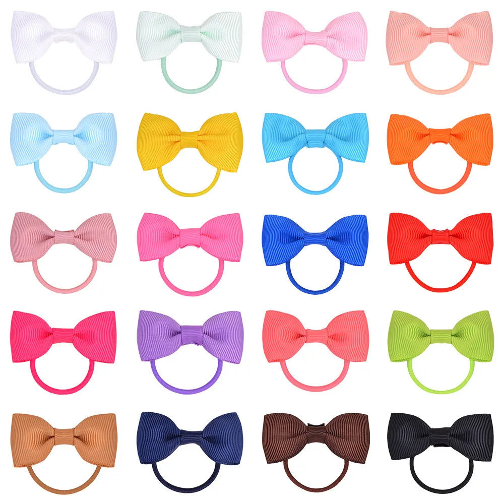 80 multi-coloured tiny hair ties with grosgrain ribbon bows for baby girls and toddlers.