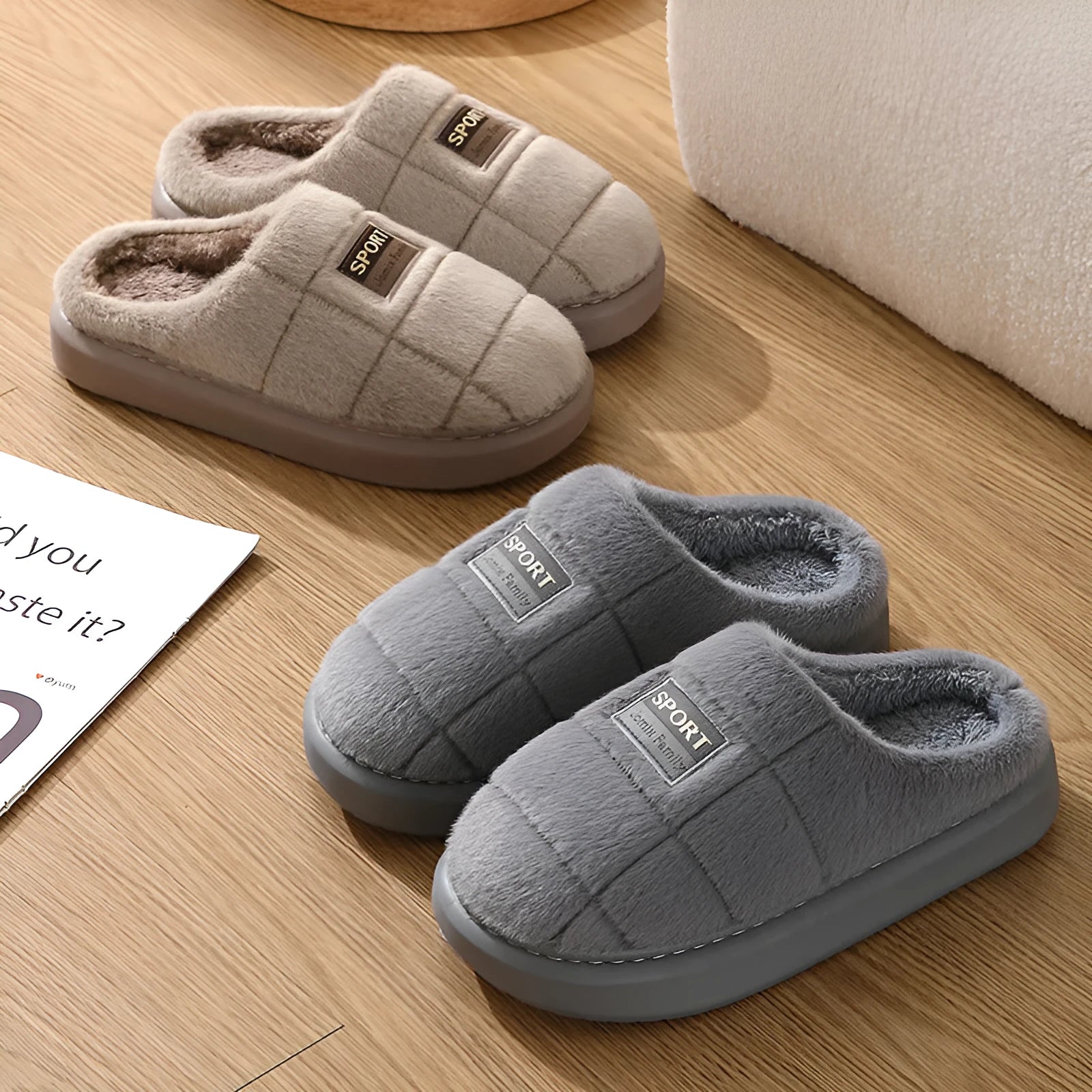 Men's grey plaid rabbit hair slippers with a thick sole, shown on a wooden floor.