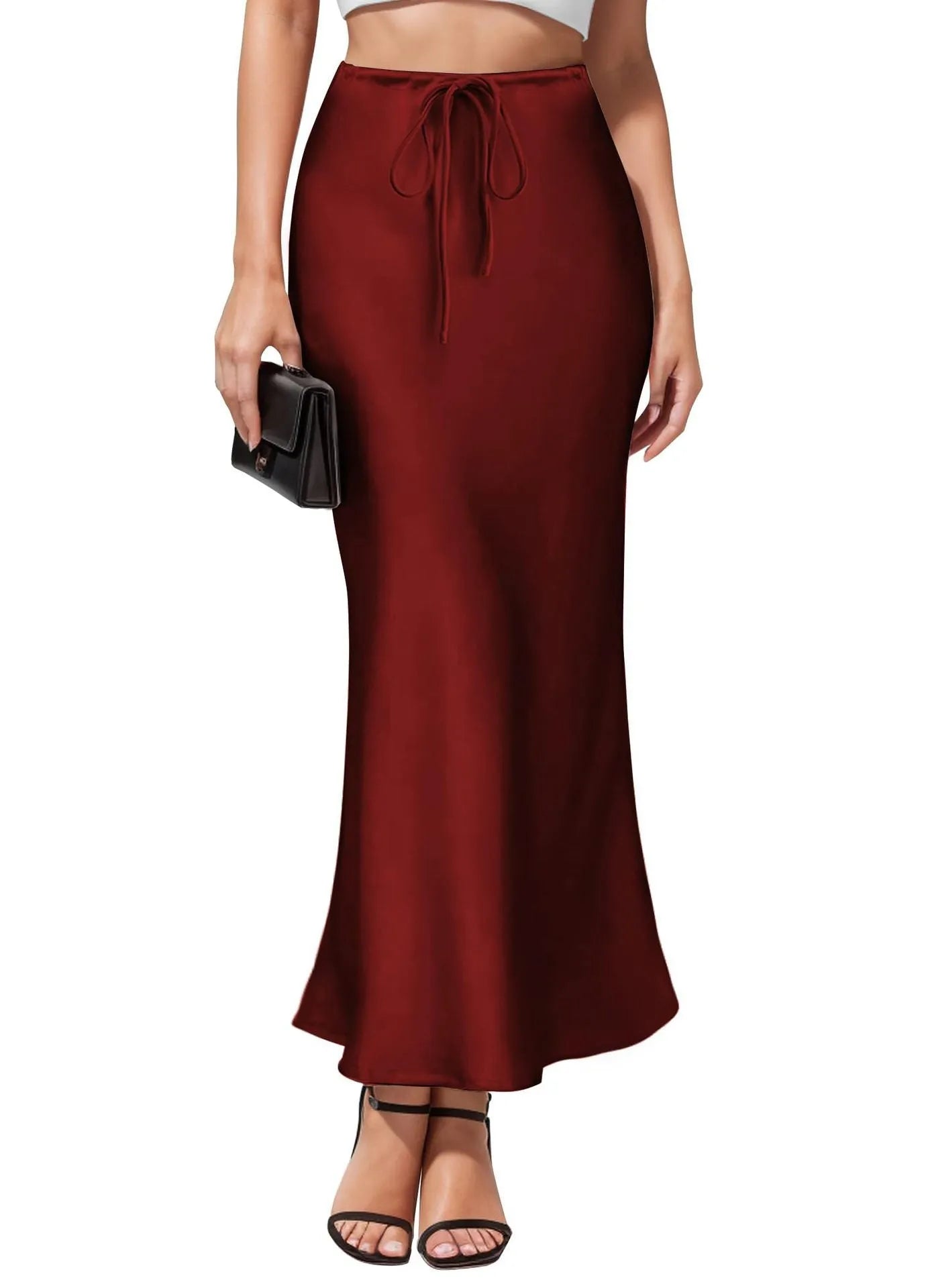 Asymmetric acetate satin skirt with high waist and irregular stitching detail in solid colour.