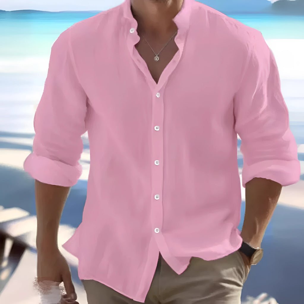 Men's long-staple cotton pullover shirt in light blue with collage stitching detail, laid flat.