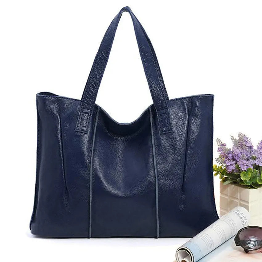 Top grain leather single shoulder tote bag in Apricot colour with stitching and patchwork design